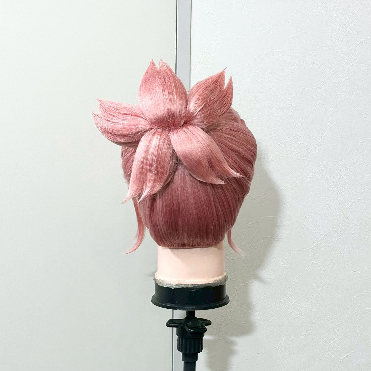 The back of the wig, with the gathered loop section at the crown