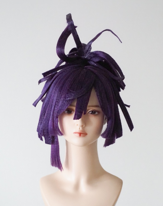 Purple sculpted wig with layered spikes and raised curved strands