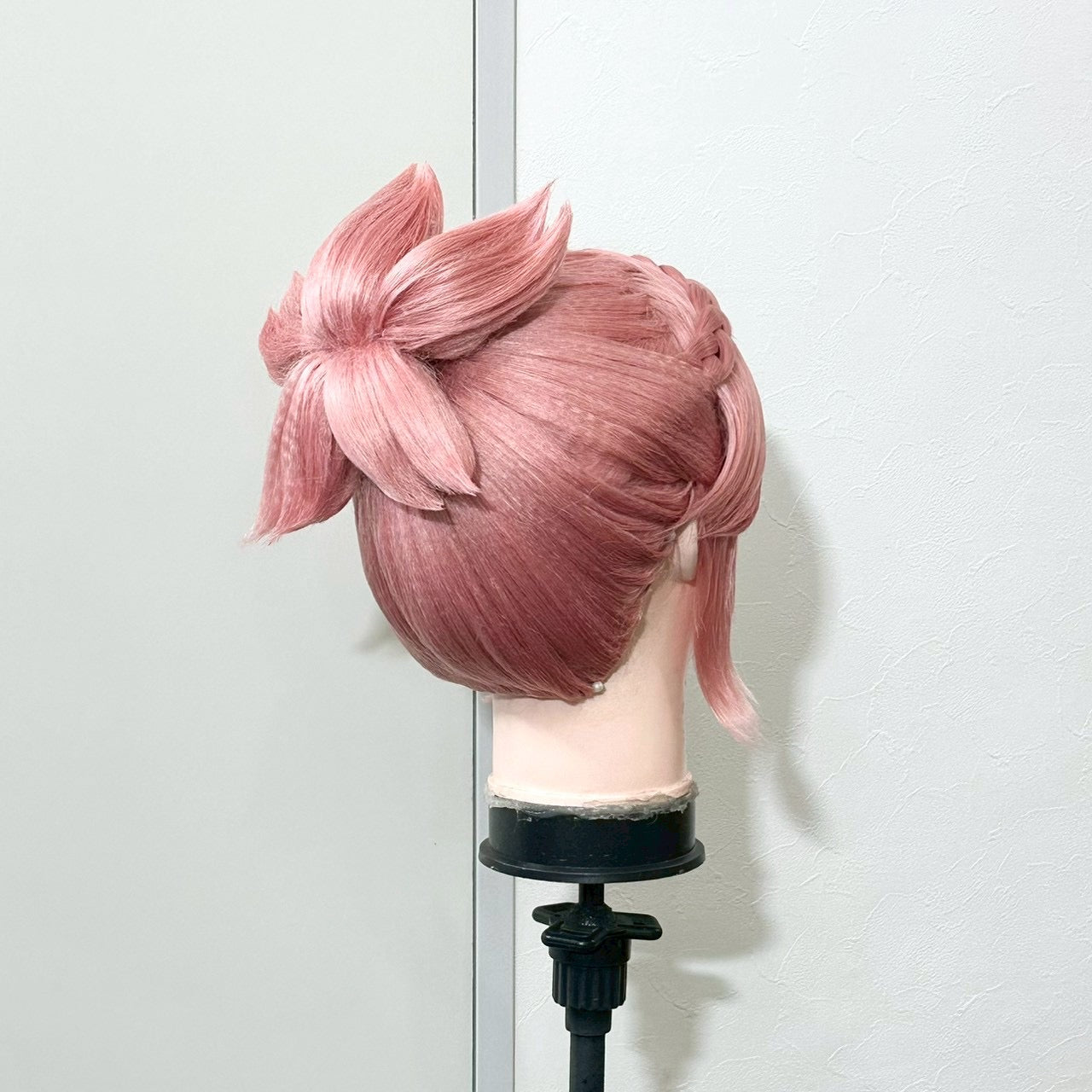 The wig from the opposite side, showing the tapered lengths at the nape