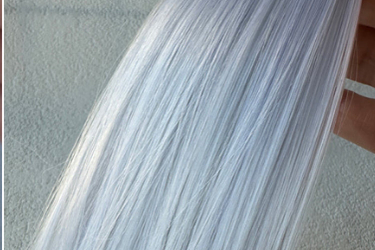 Close-up of silver fiber showing sheen and strand direction
