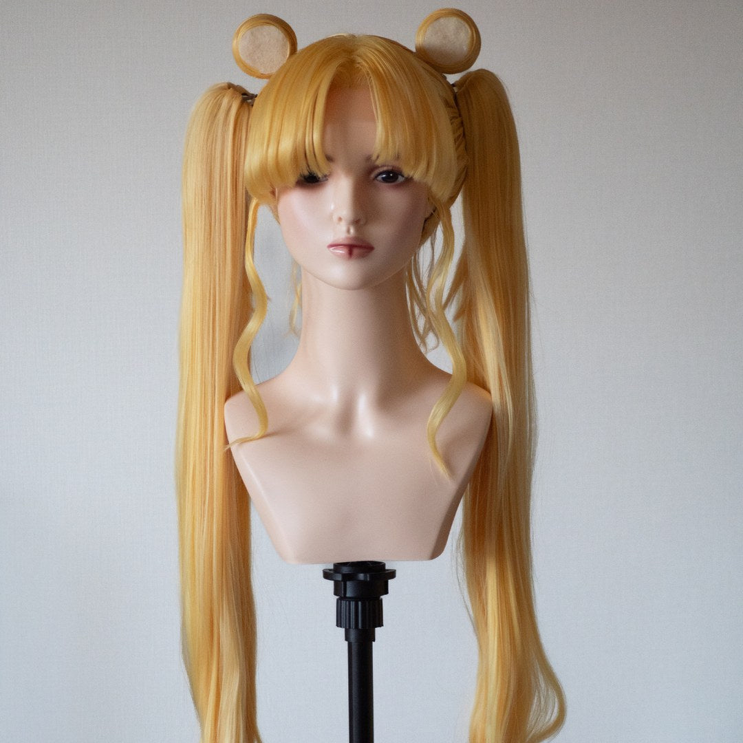 Long blonde wig with formed round buns and twin lengths